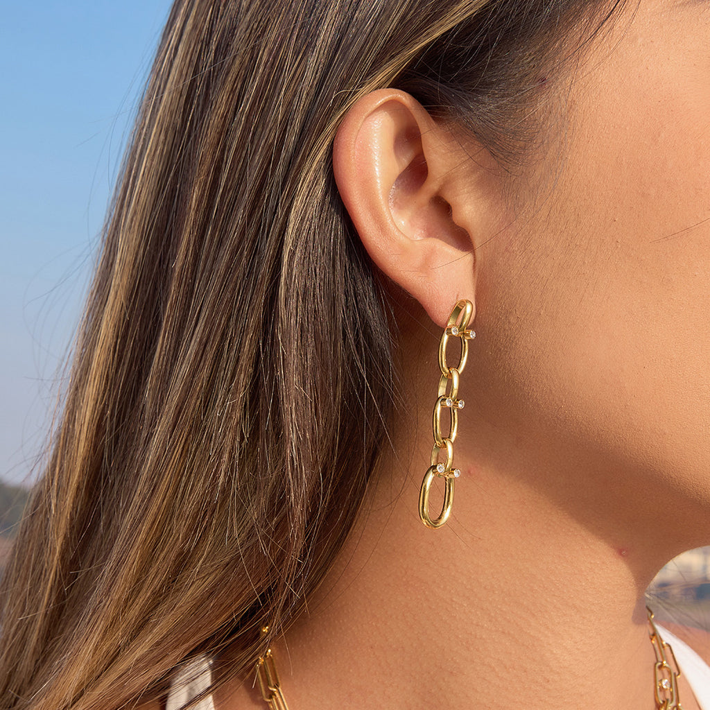 long three-link chain drop earring in side view
