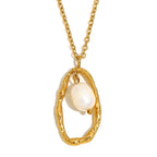 isolated hammered oval necklace with hanging white pearl-style bead