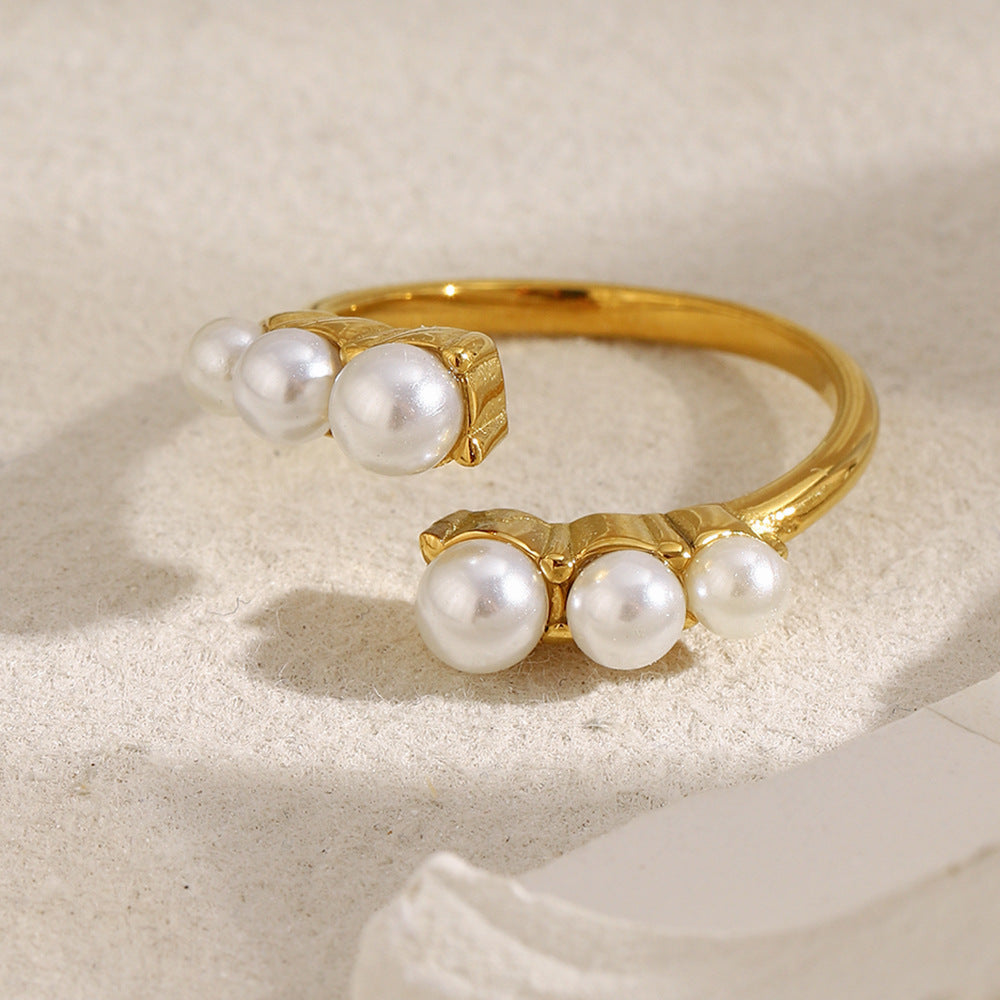 gold plated stainless steel open ring with six imitation pearls