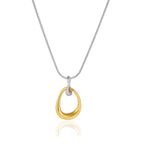 Two-tone open teardrop necklace against white