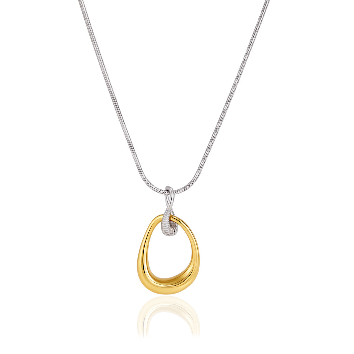 Two-tone open teardrop necklace against white