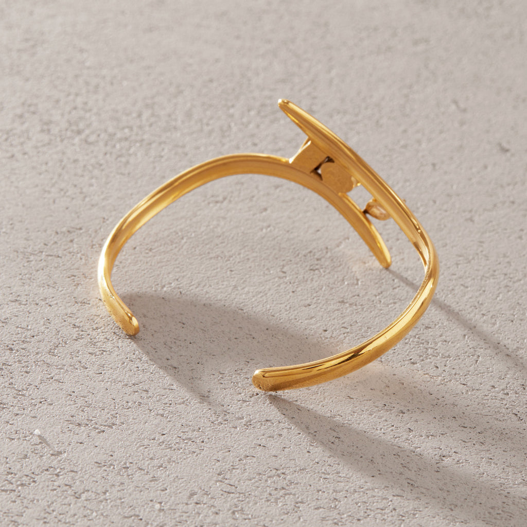 Reverse of the open cuff showing the stone settings