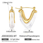 White resin hoop with gold-tone inner curve