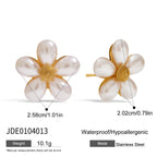 White petal stainless steel flower studs with width and height measurements