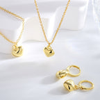 matching puffed heart pendant necklace bracelet and hoop earrings
