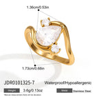 Pear-center curved ring with small round accents