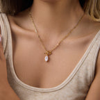Marquise stone toggle necklace worn at neckline