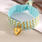 Blue Fabric Tie Bracelet with Gold Plated Stainless Steel Heart Locket — blue fabric tie detail