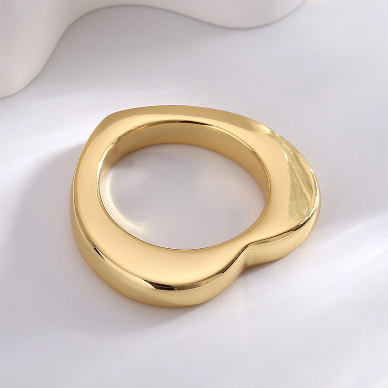 angled gold plated heart ring with smooth rounded edges