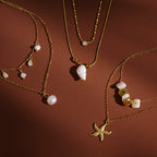 Three double-layer coastal necklace designs displayed together