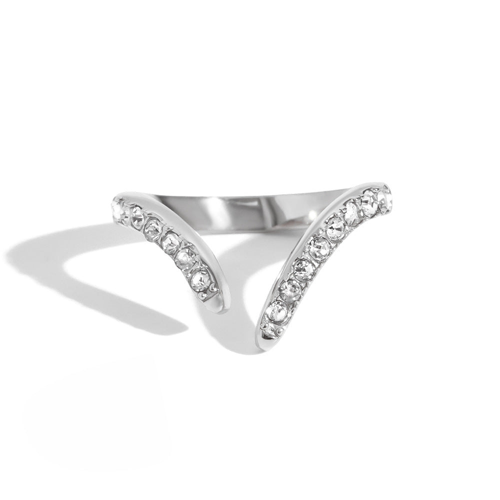 V-shaped clear-accent ring on white