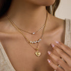 Mixed-shape cluster necklace shown in a layered look