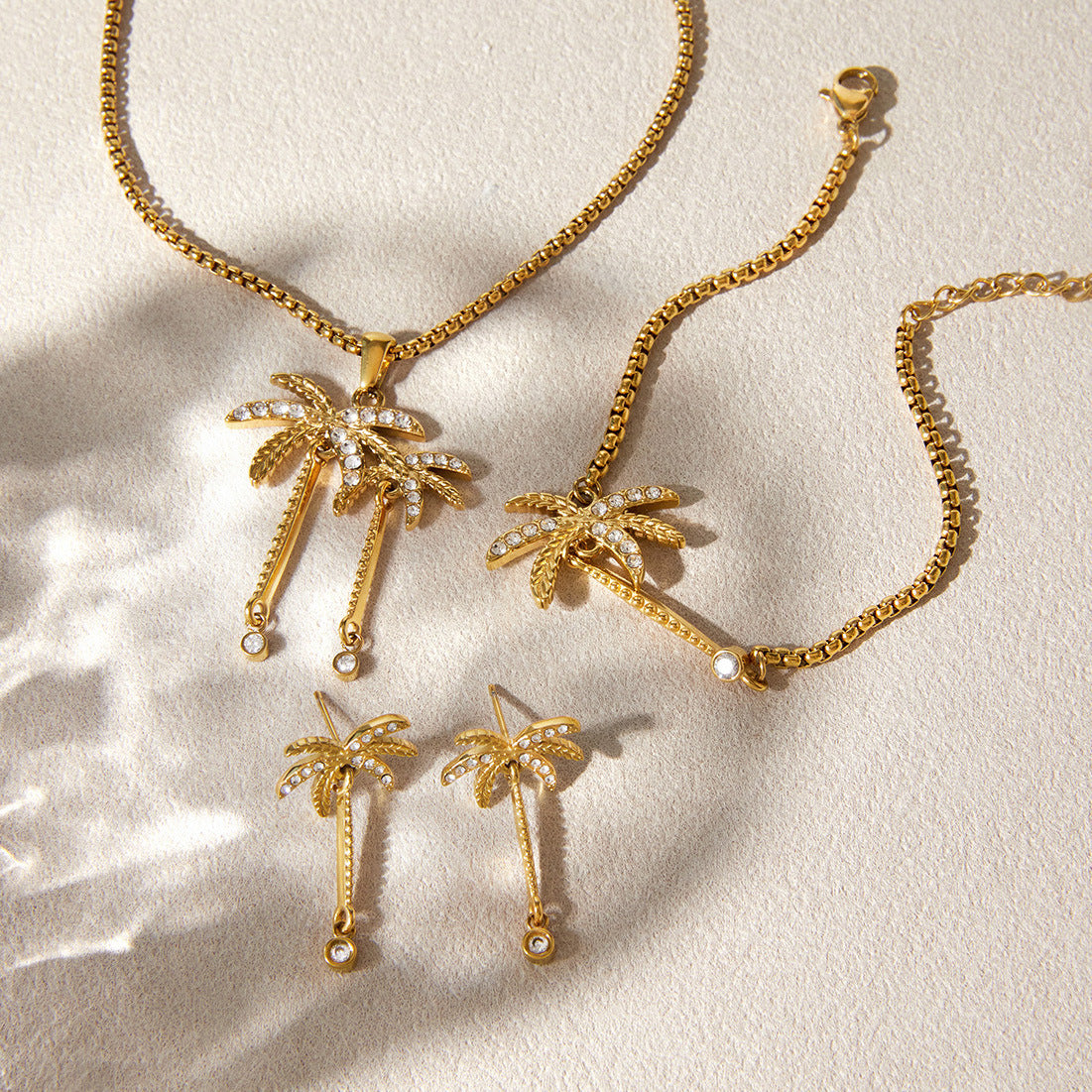 Stone-accent palm jewelry laid on fabric