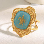 front angle of the blue enamel turtle medallion ring