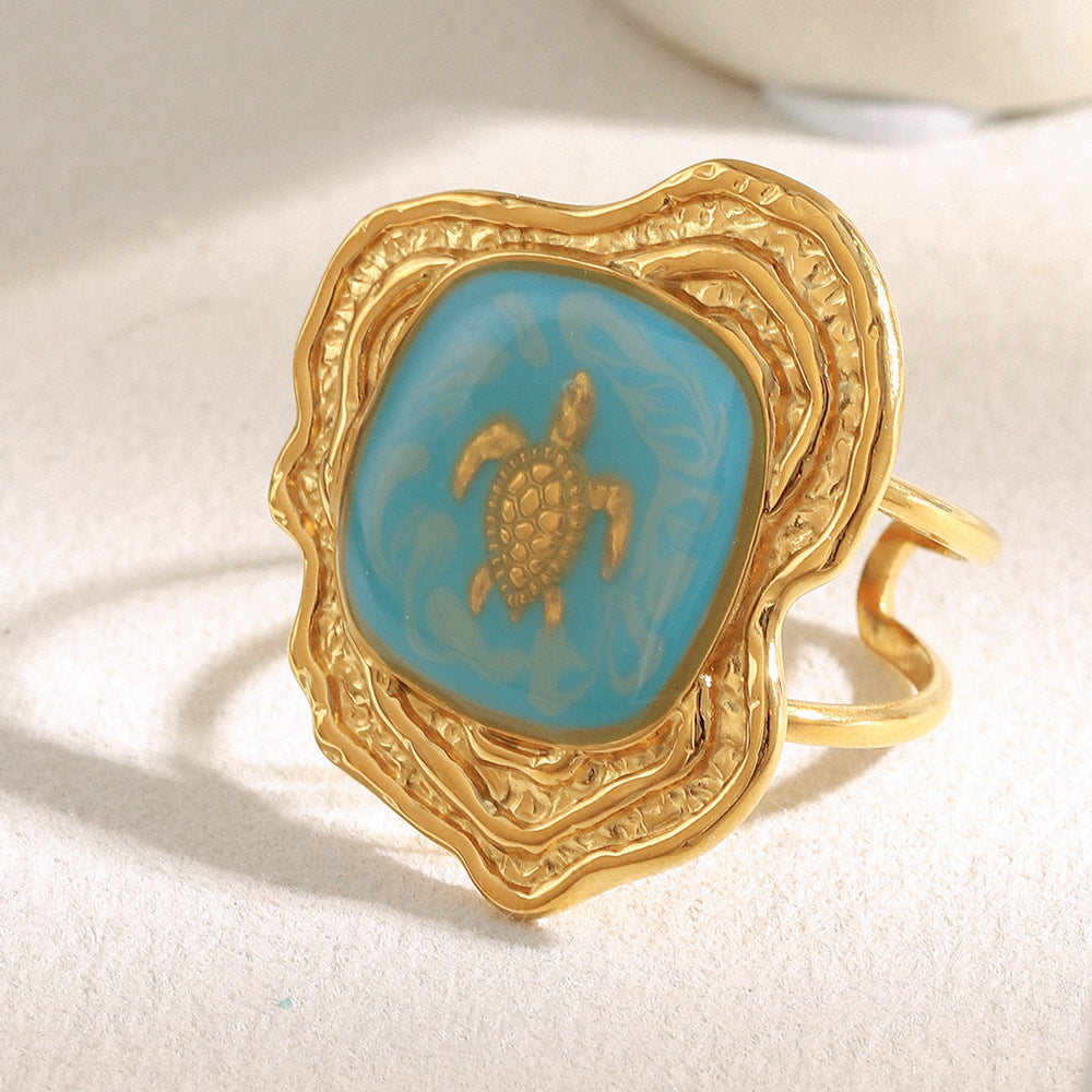 front angle of the blue enamel turtle medallion ring