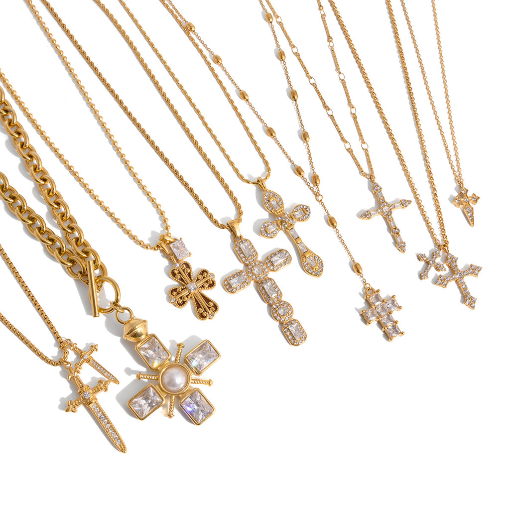 Cross necklace assortment displayed on white