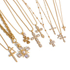 Cross necklace assortment displayed on white