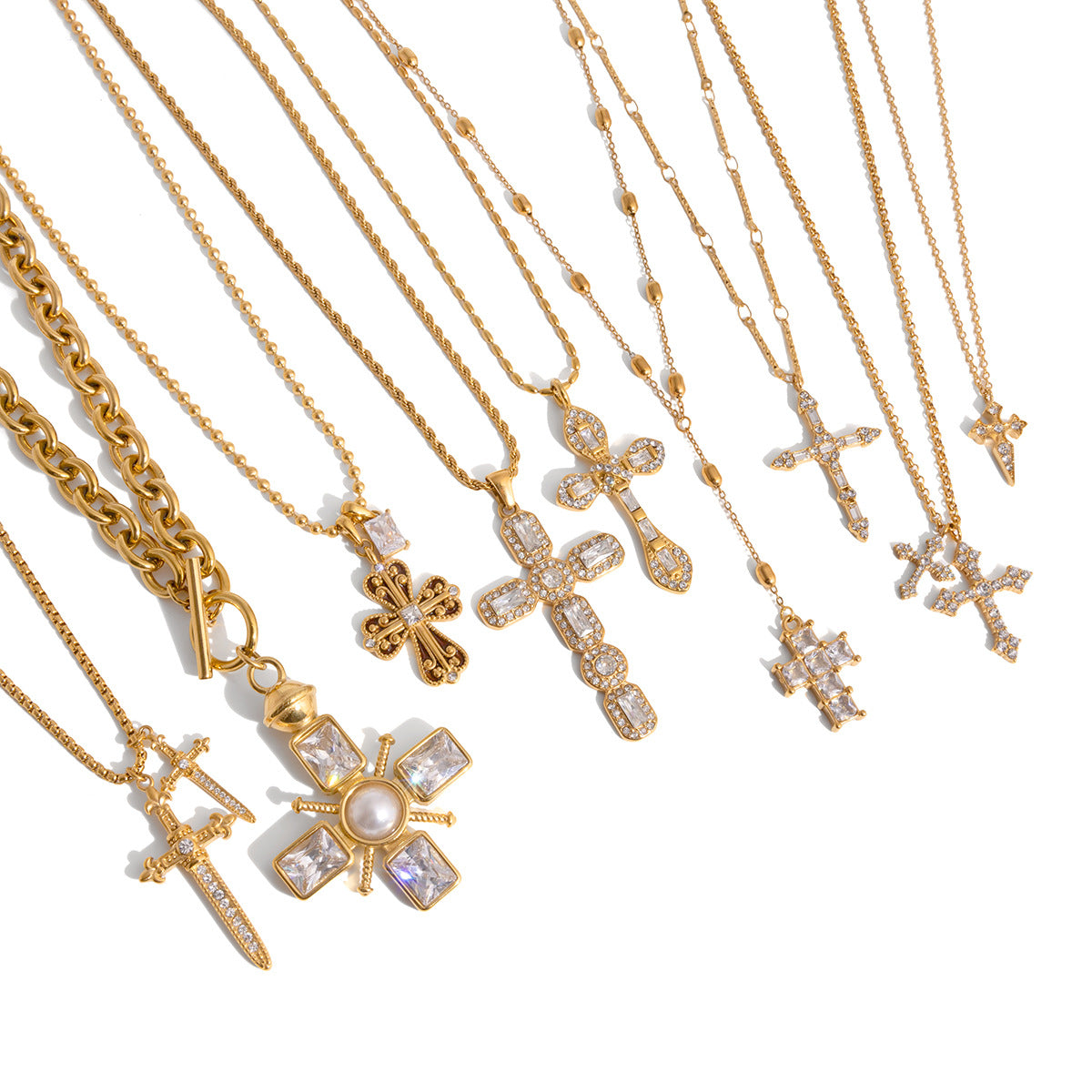 Cross necklace assortment displayed on white