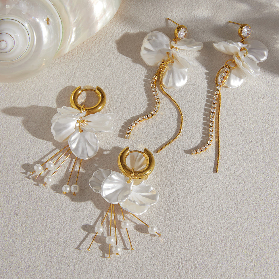 Two white petal tassel earring designs displayed together