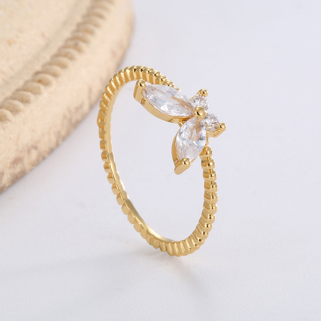 angled side view of the butterfly motif ring setting