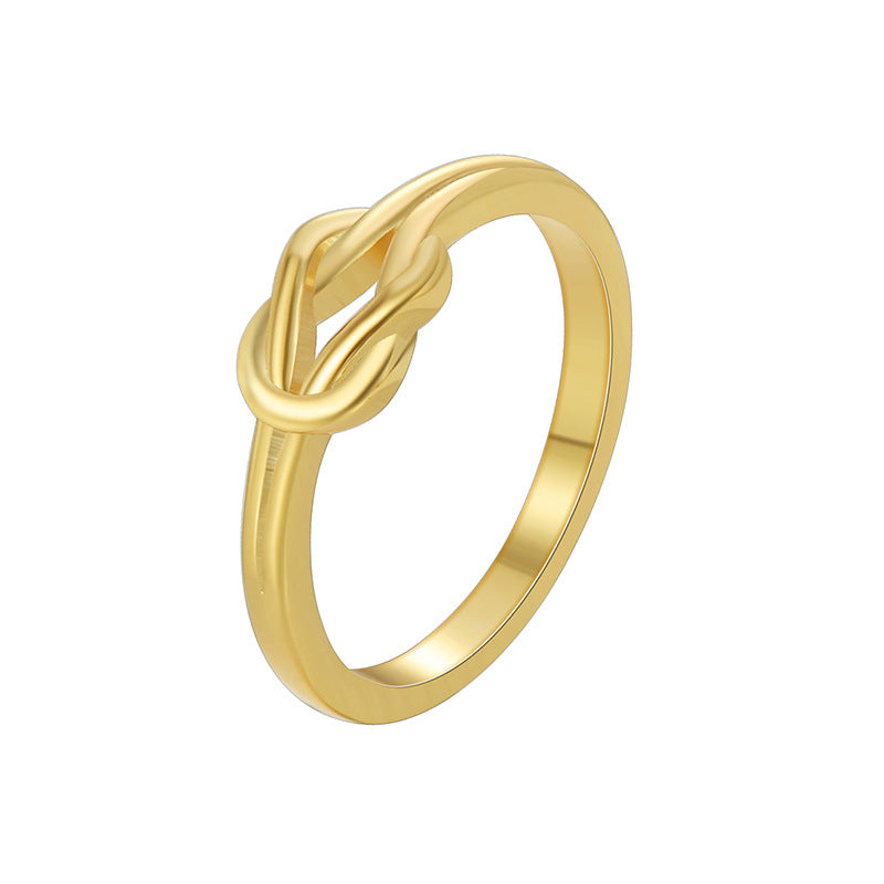 white-background view of gold plated three-loop knot ring