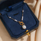 gold plated toggle necklace with irregular white pearl-style bead drop