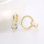 open hinged hoop and side setting of clear round zirconia earrings