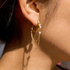 side view of the pear-accent chain drop hoop earring
