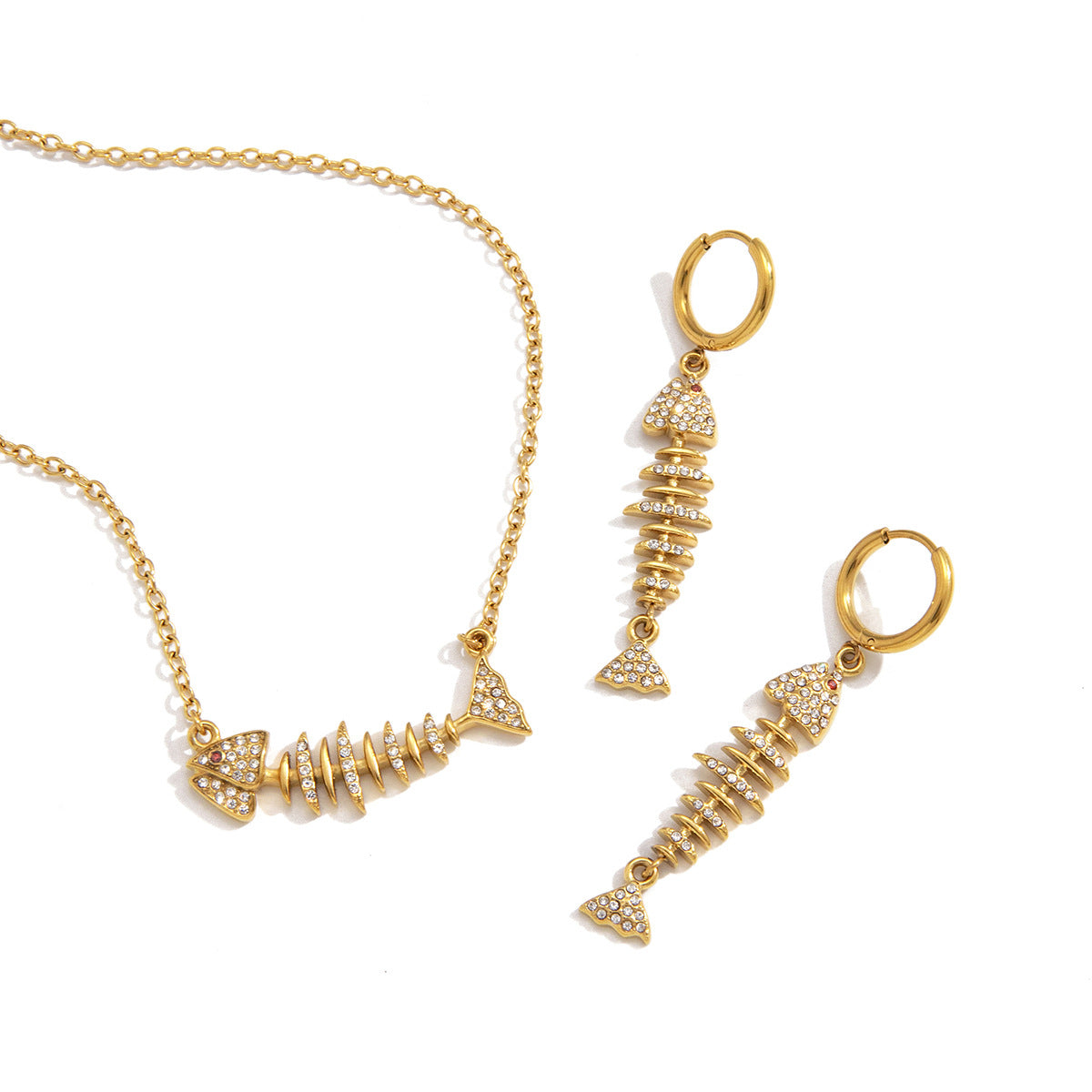 Horizontal and vertical fish jewelry designs on white