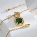 Green stone pendant necklace showing its lobster clasp and extension chain