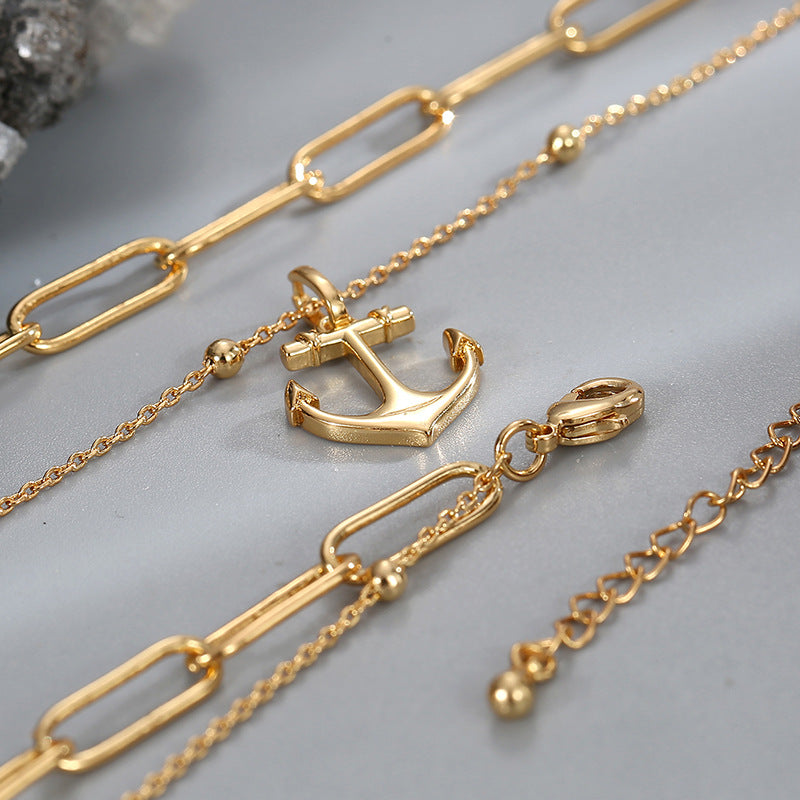 anchor pendant, paperclip links and extension chain details