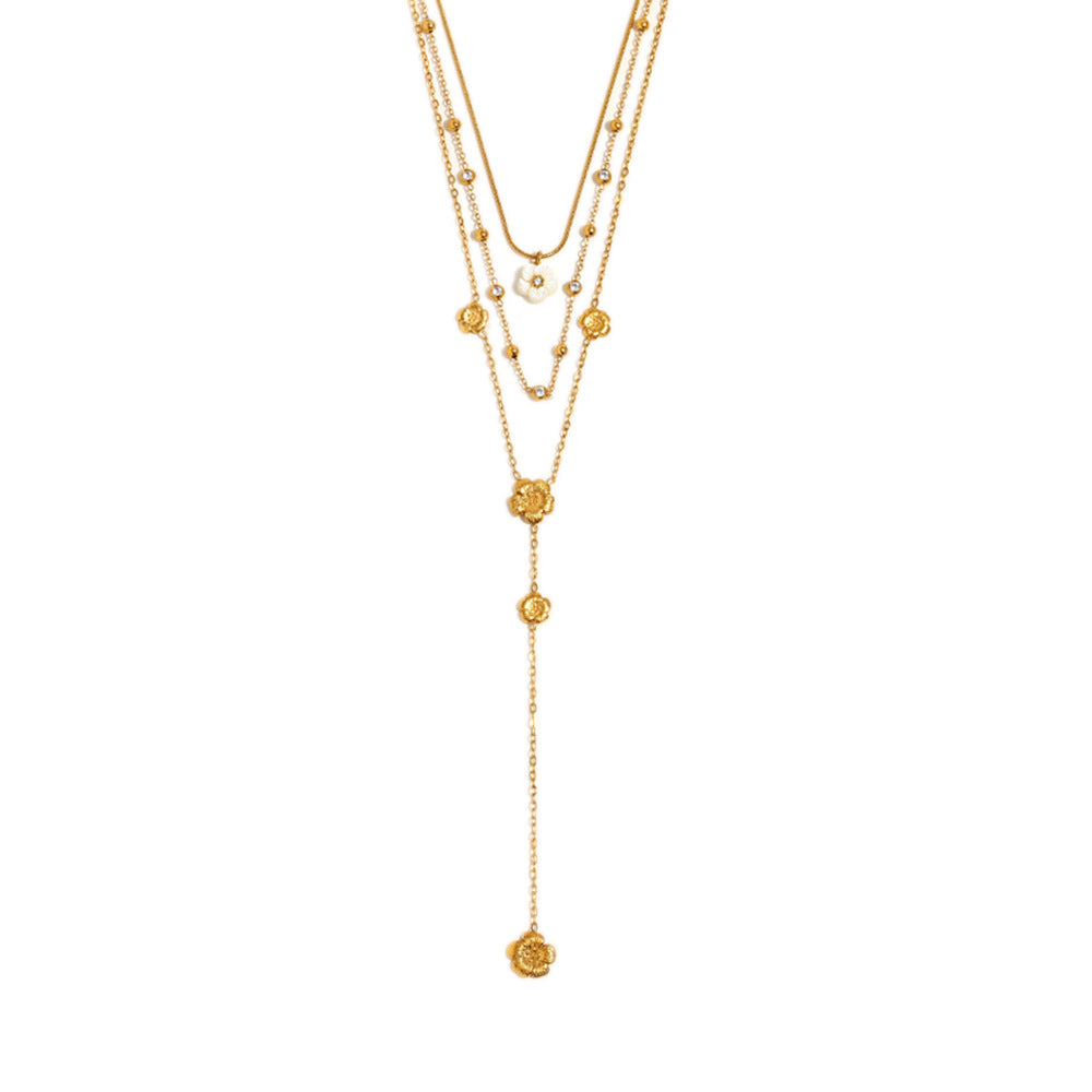 isolated front view of the triple-layer flower station necklace