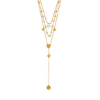 isolated front view of the triple-layer flower station necklace