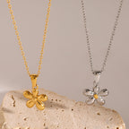 Five-petal stainless steel flower necklaces on display