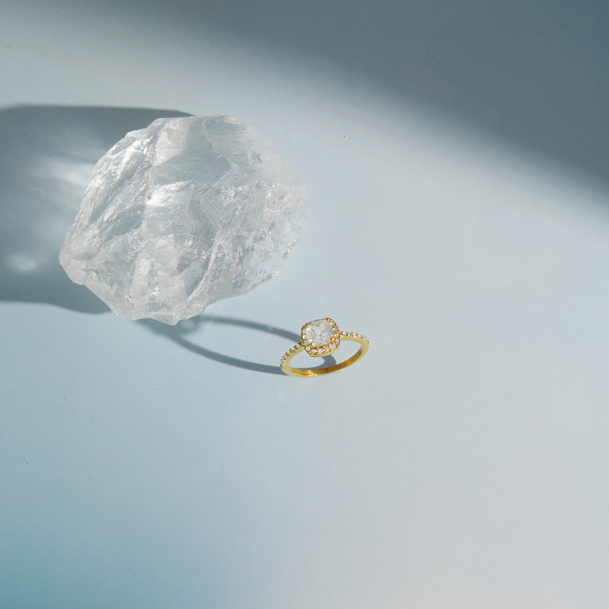 Halo ring viewed beside a translucent display stone