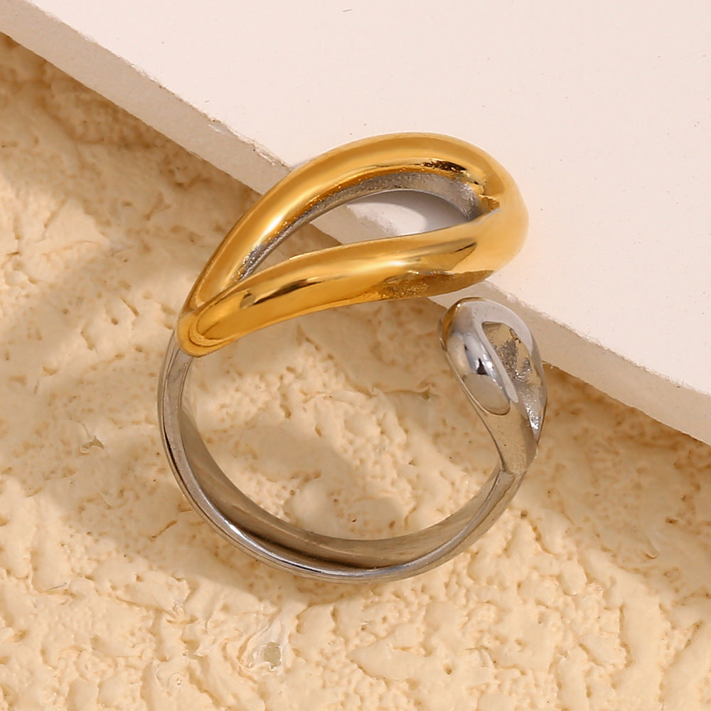 angled front view of the sculptural double teardrop open ring