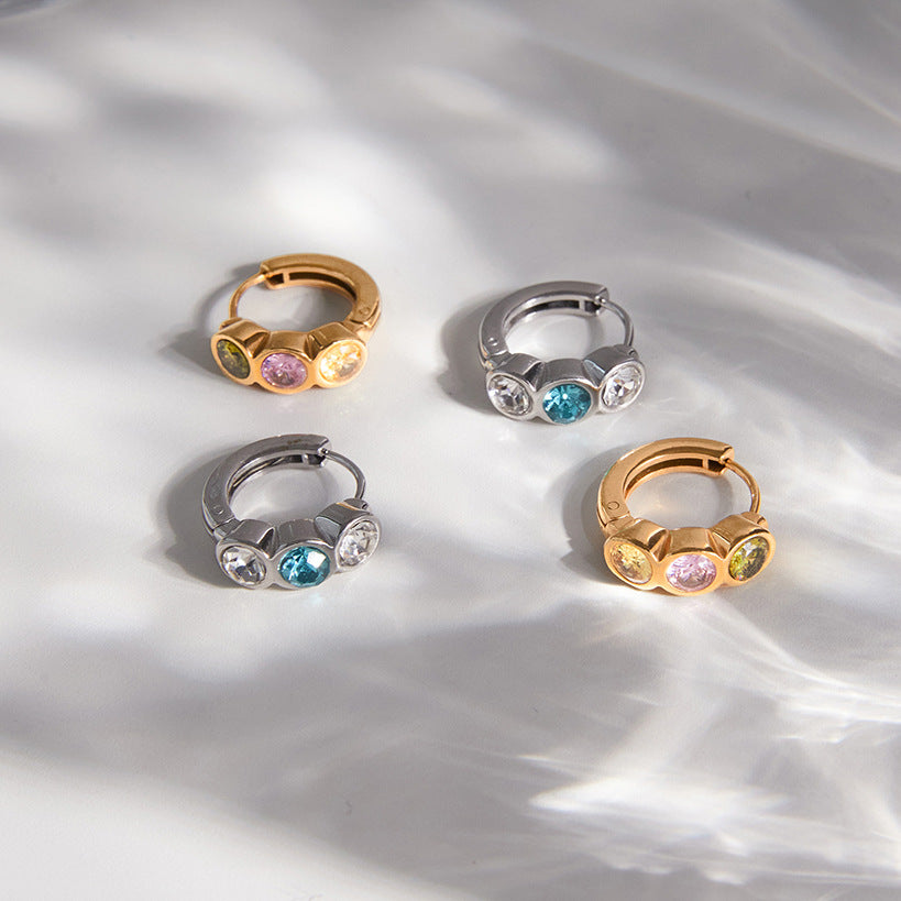 Colored stone hoops with hinges visible