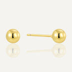 front and side view of gold plated ball stud earrings