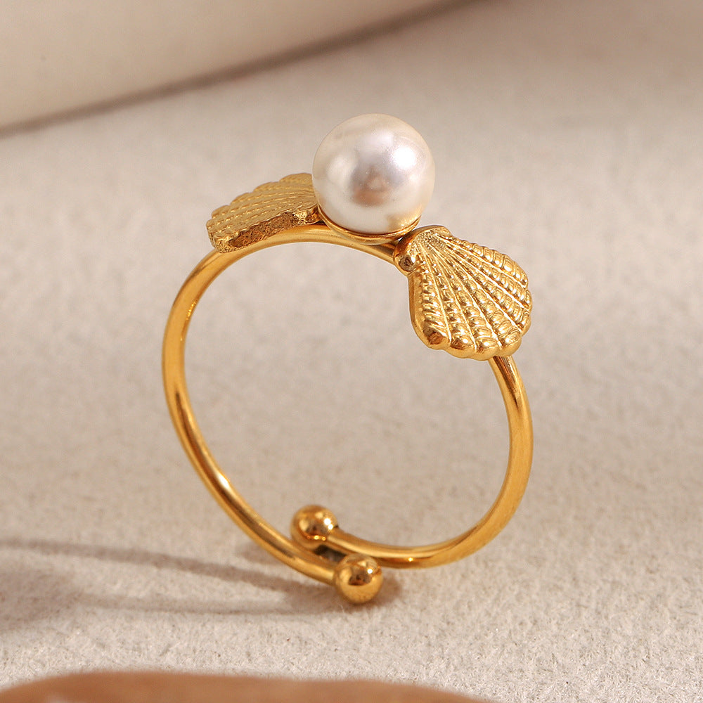 side view of the slim gold plated shell pearl open ring