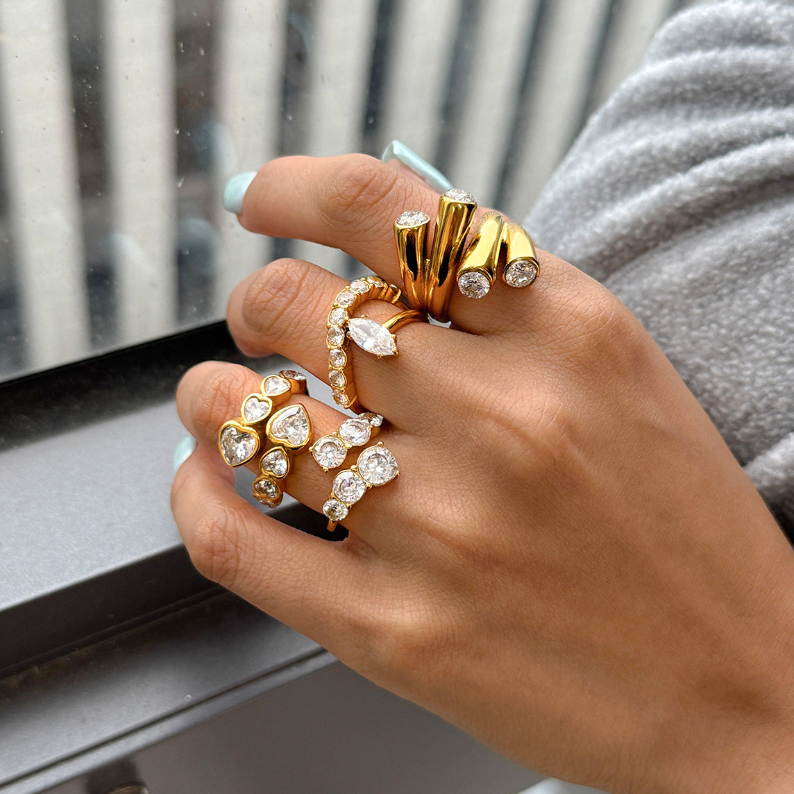 Gold Plated Clear Stone Stainless Steel Statement Ring Collection — four-ring assortment