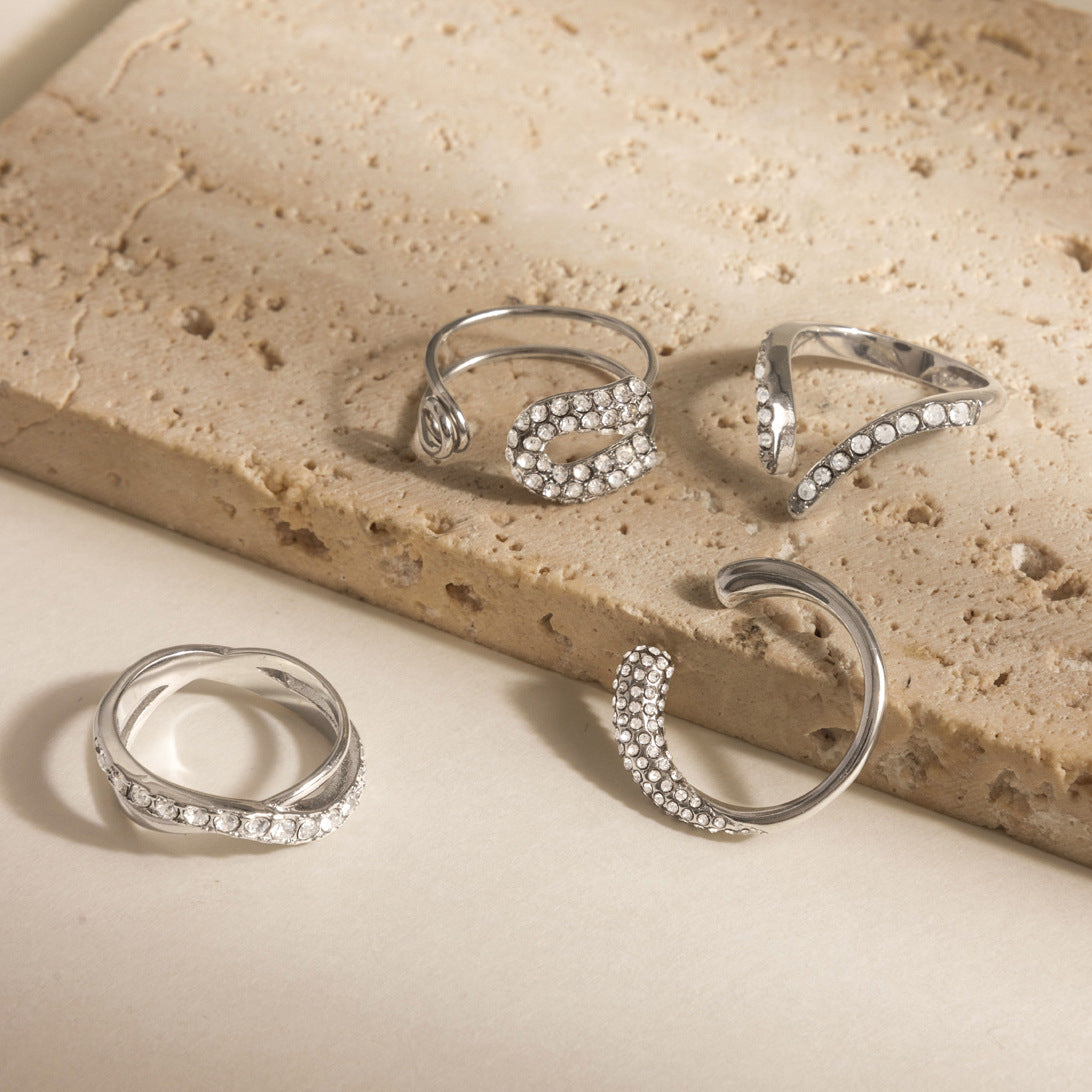 Open and crossover ring designs on stone blocks