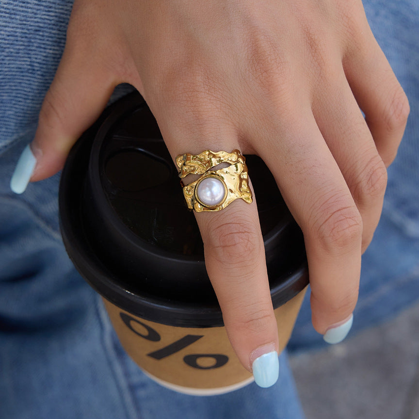 Broad white-accent ring shown on a hand