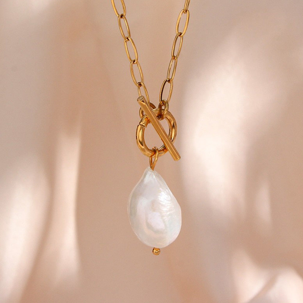 gold plated stainless steel toggle necklace with irregular freshwater pearl drop