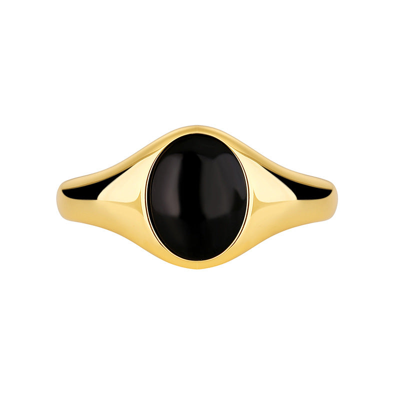 isolated oval black resin signet ring on white