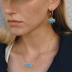 Gold-Tone Turquoise-Color Evil Eye Stainless Steel Jewelry Collection shown on model