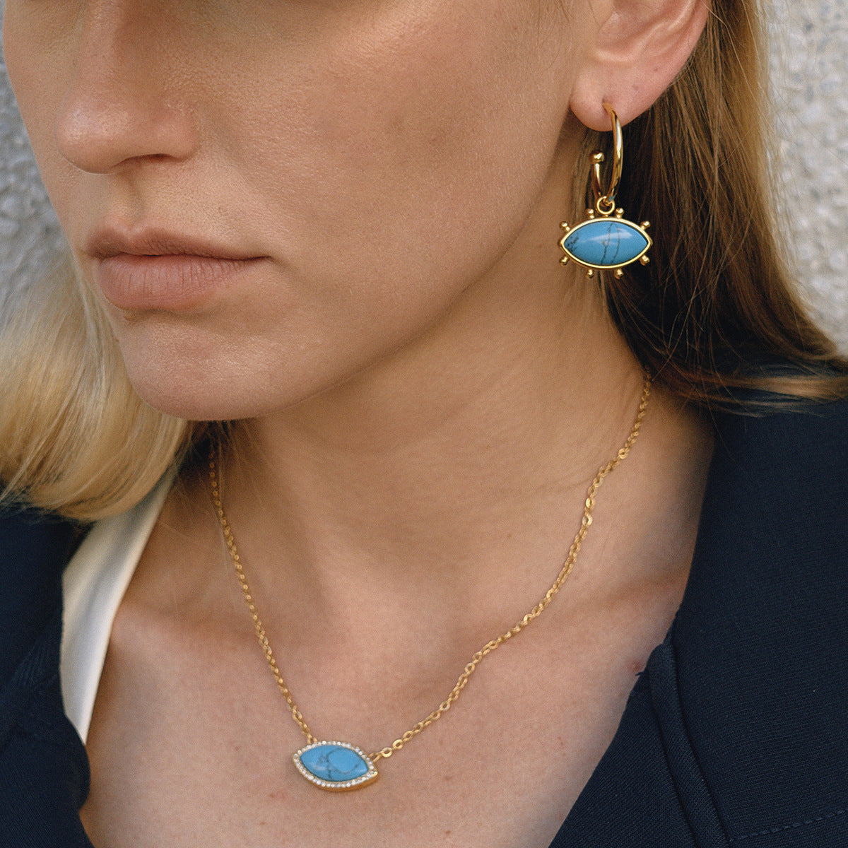 Gold-Tone Turquoise-Color Evil Eye Stainless Steel Jewelry Collection shown on model