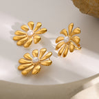 Gold Plated Stainless Steel Sculptural Flower Open Ring — styled view