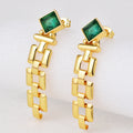 gold plated green zirconia link drop earrings in an angled studio view