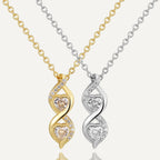gold plated and silver-finish double twist pendant necklaces with clear stones