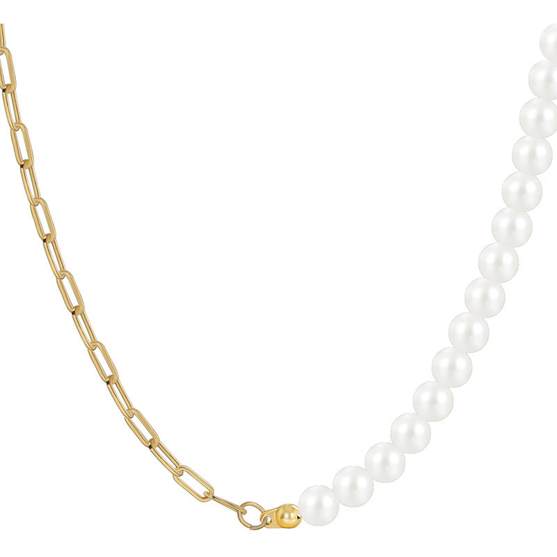 isolated gold plated brass necklace with white pearl-style beads